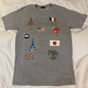 Stussy Gray Graphic Tee with Iconic locations